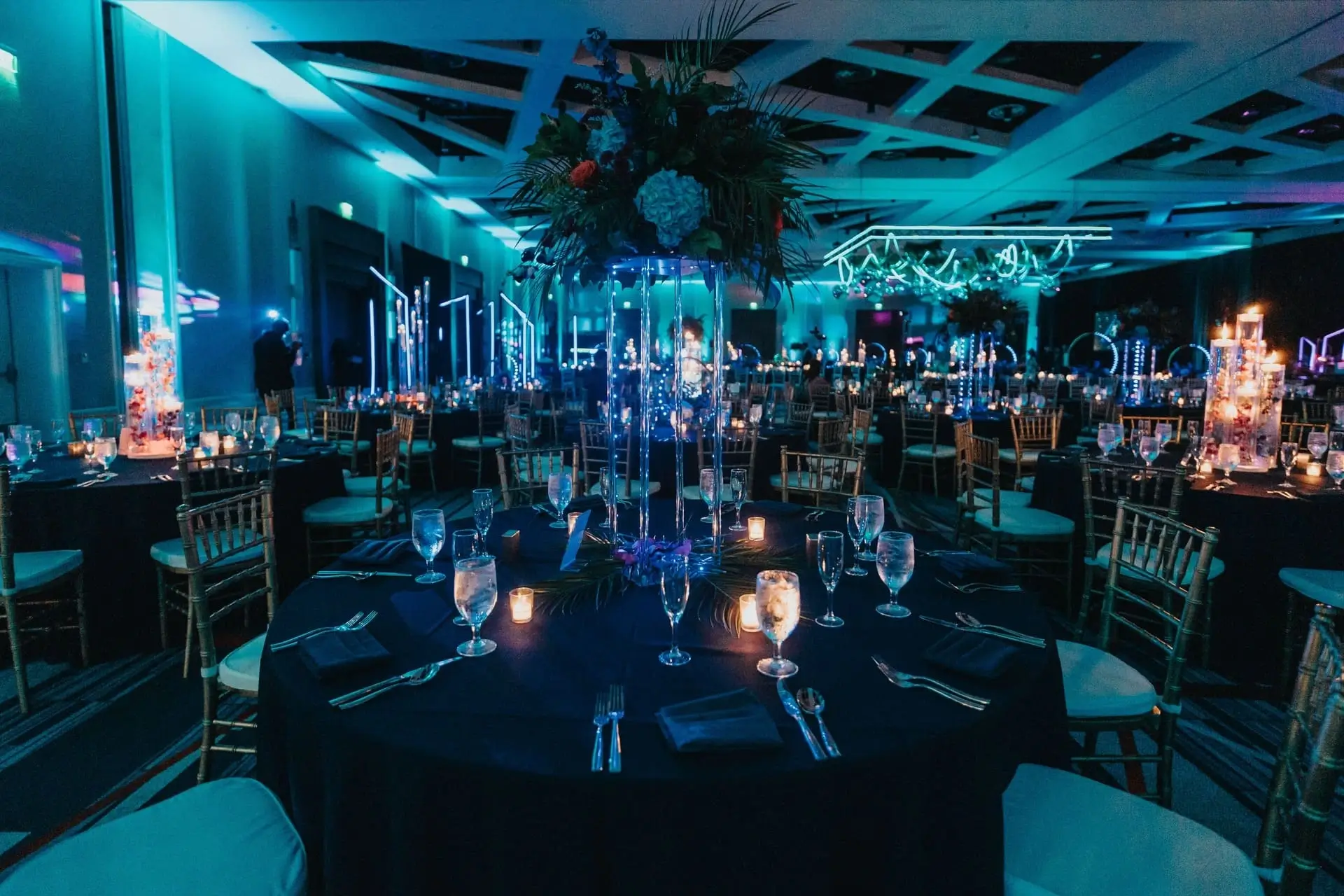 Tablescape with sculpted candles and seasonal blooms