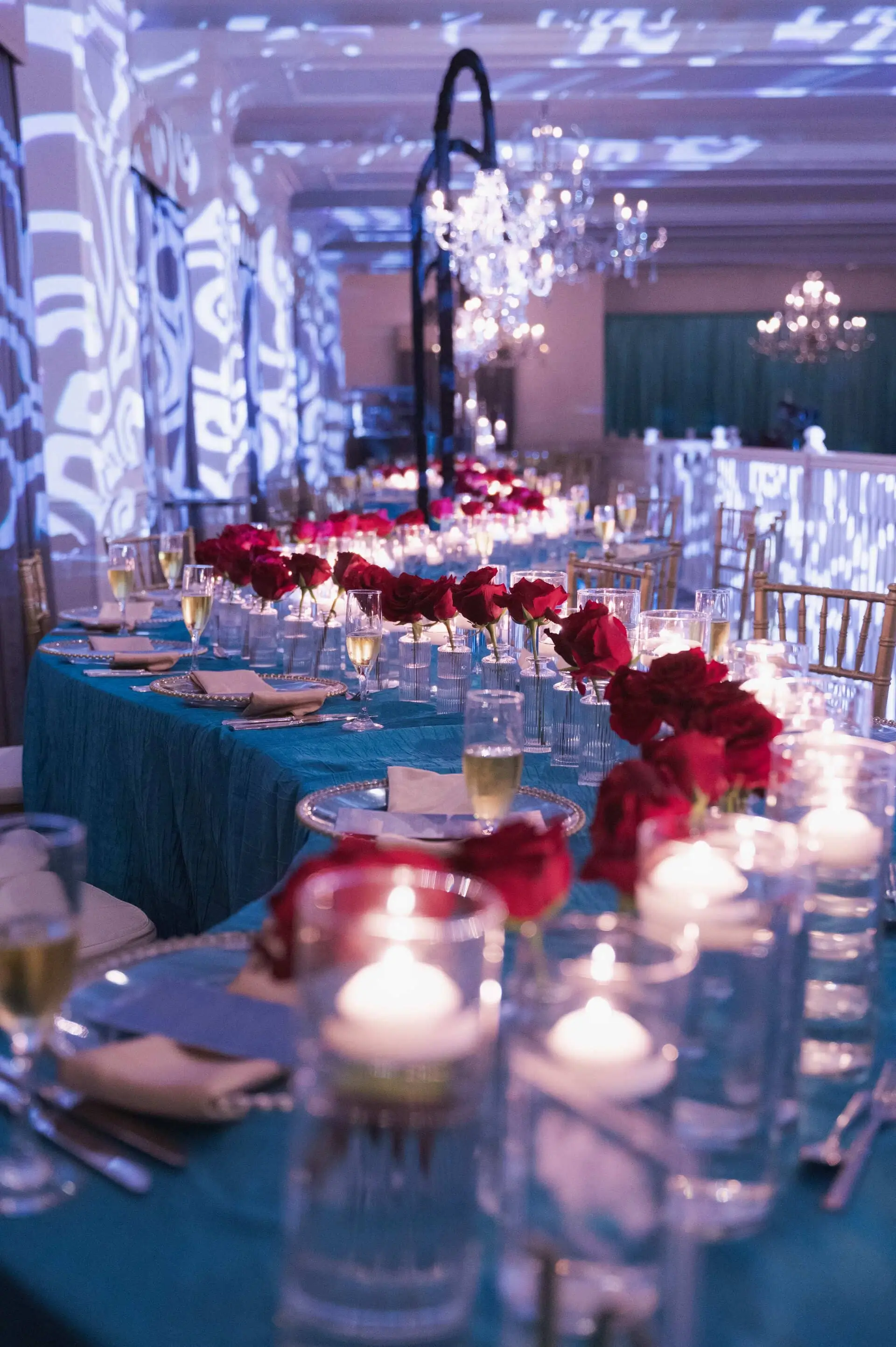 Wide of the styled affair beneath suspended florals