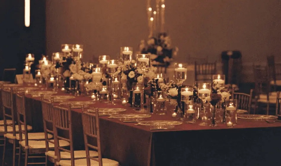 Editorial wide of the venue in the evening's signature palette