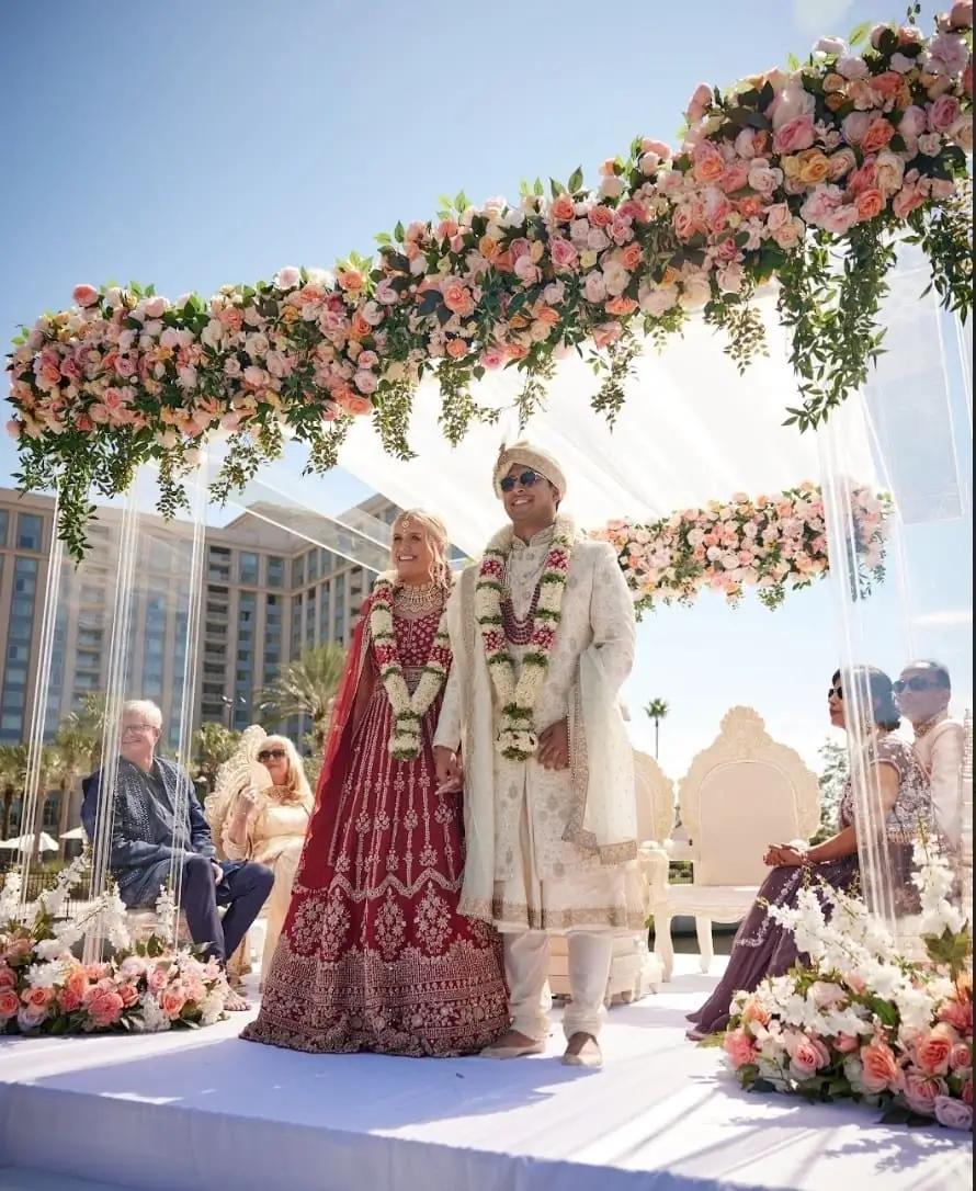 Floral detail of mandap pillar with cascading roses