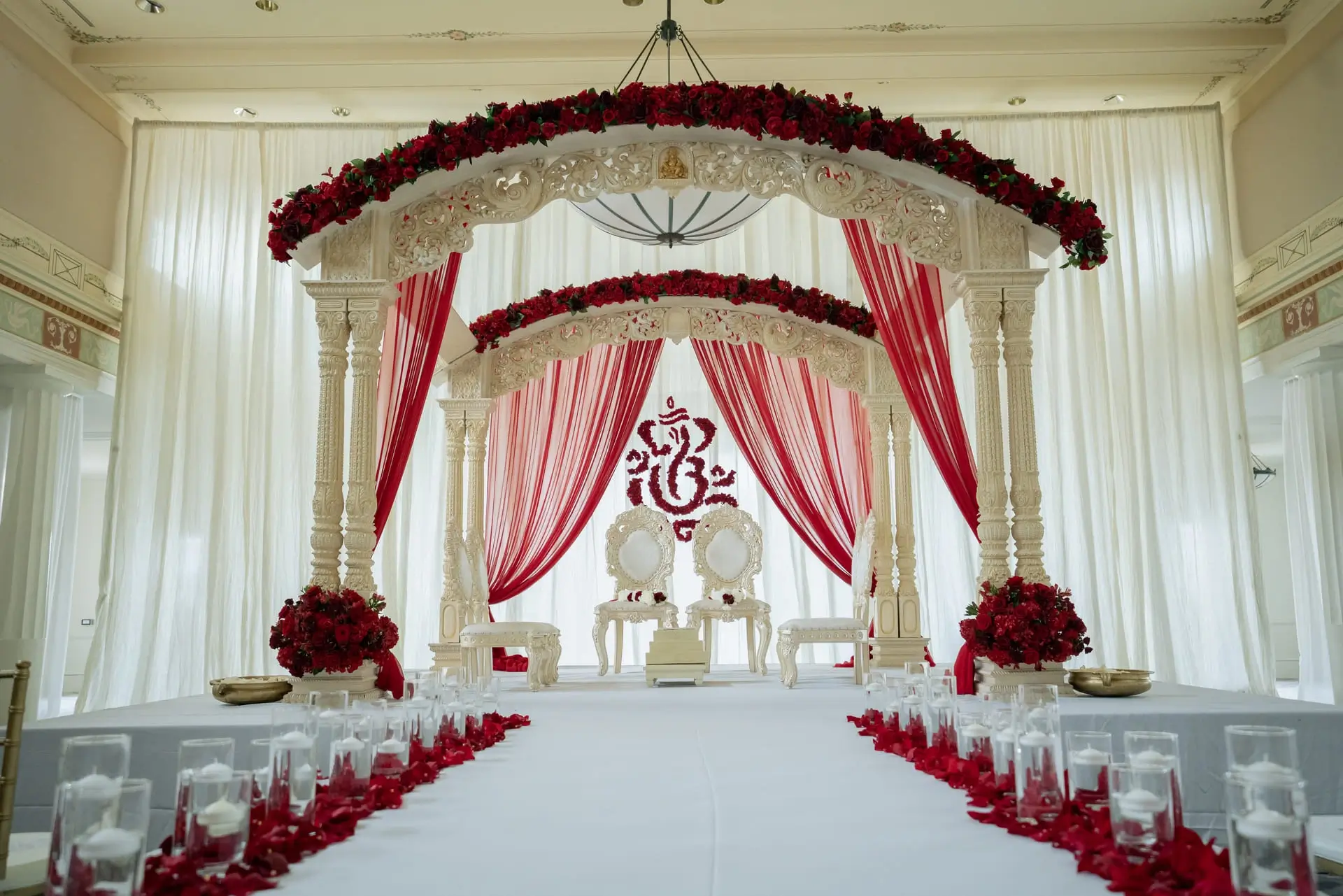 Hindu wedding ritual moment beneath the mandap