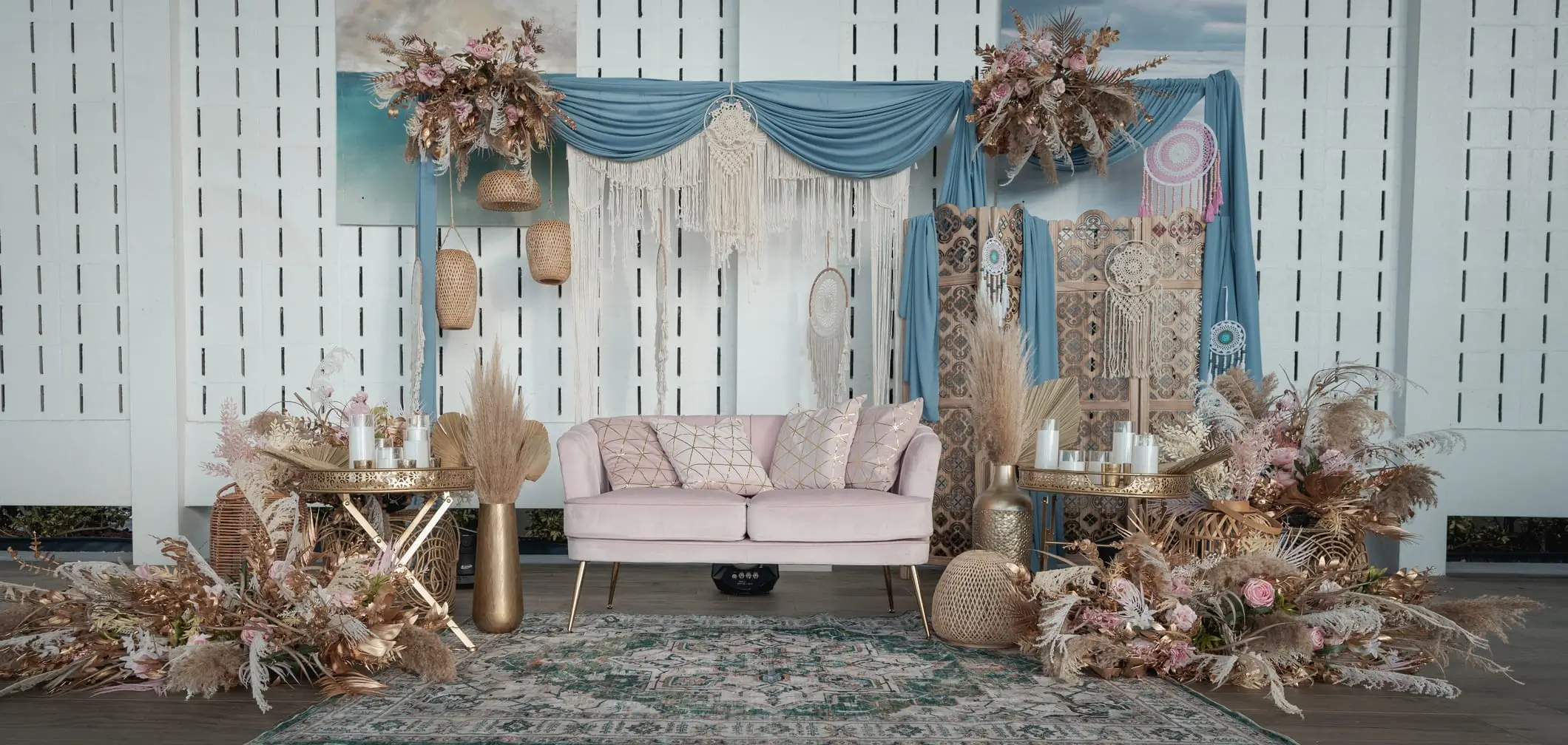 Mehndi and Sangeet evening with mirrored low seating and candles