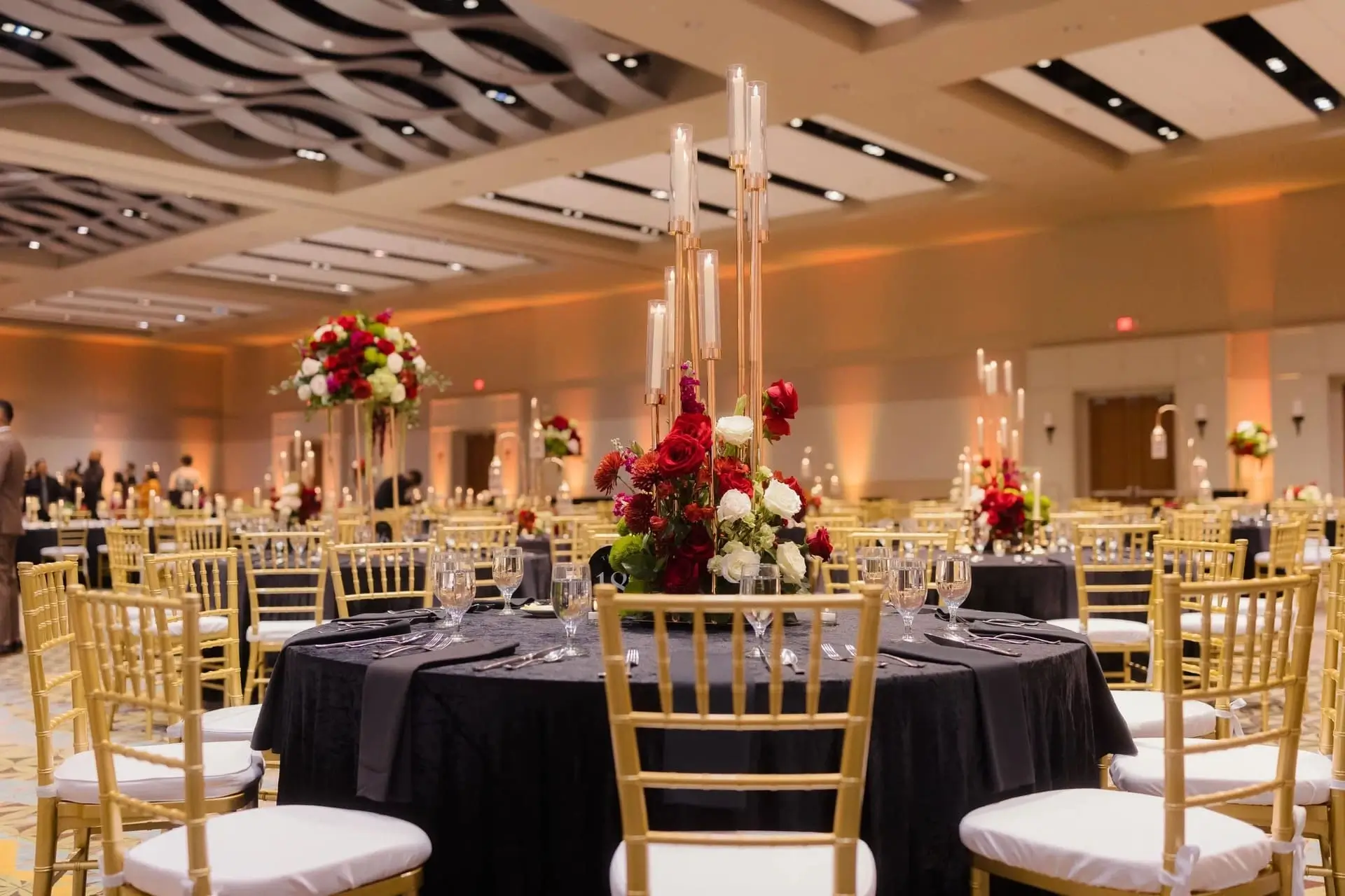 Reception detail of place setting with menu card and bud vase