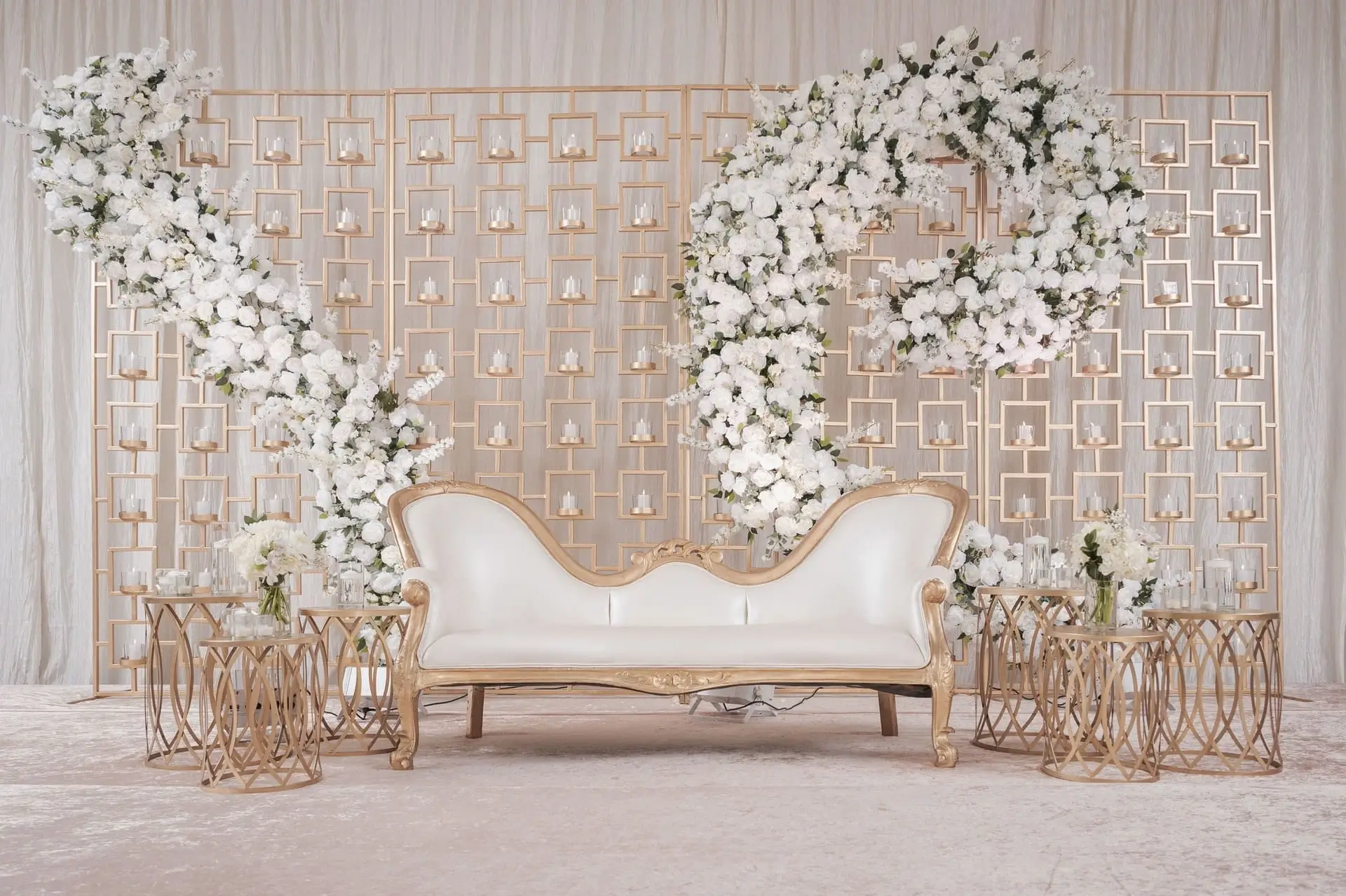 Reception tablescape with pastel florals and brass accents