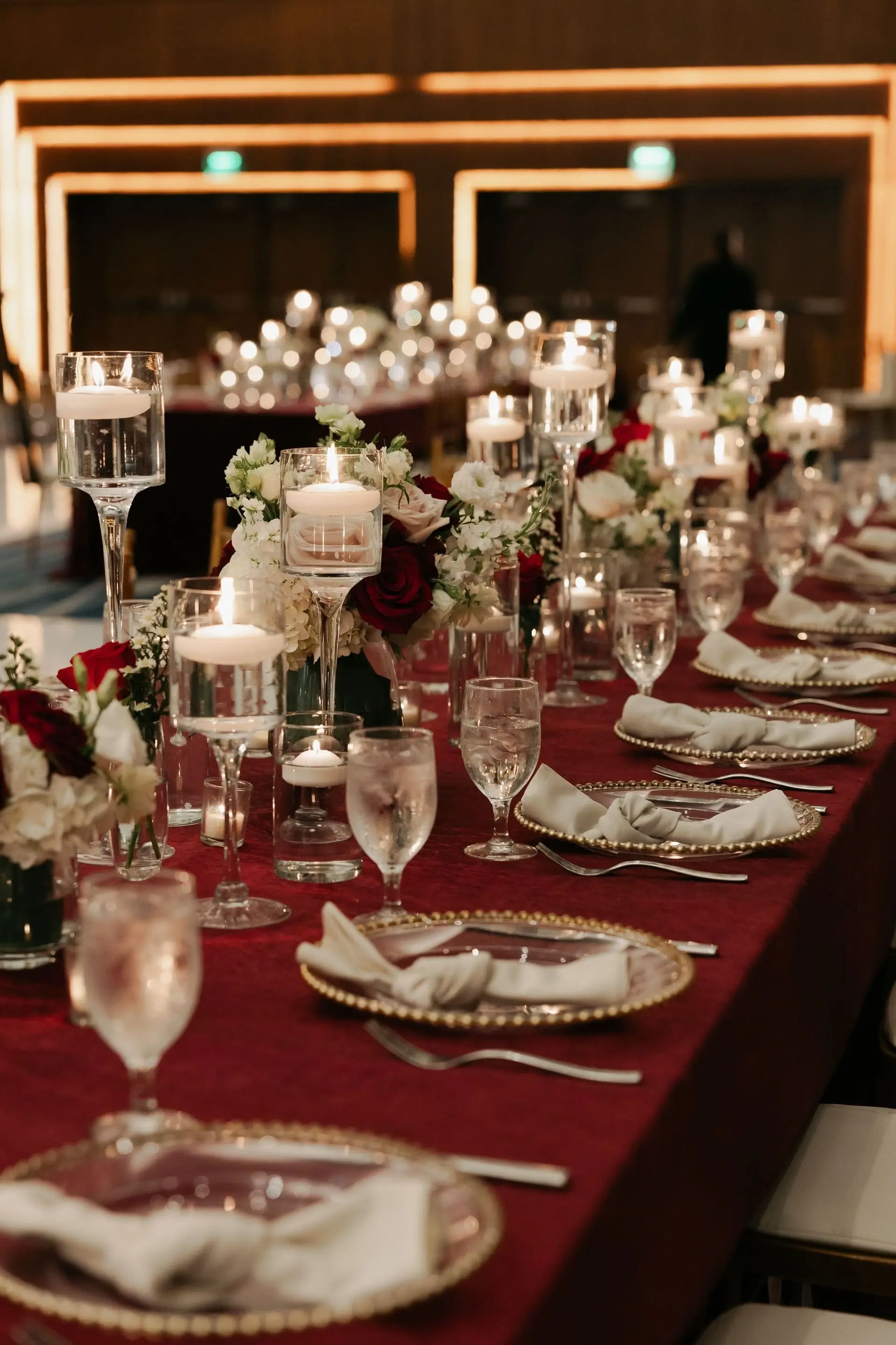 Intimate dinner scene under warm pendant light