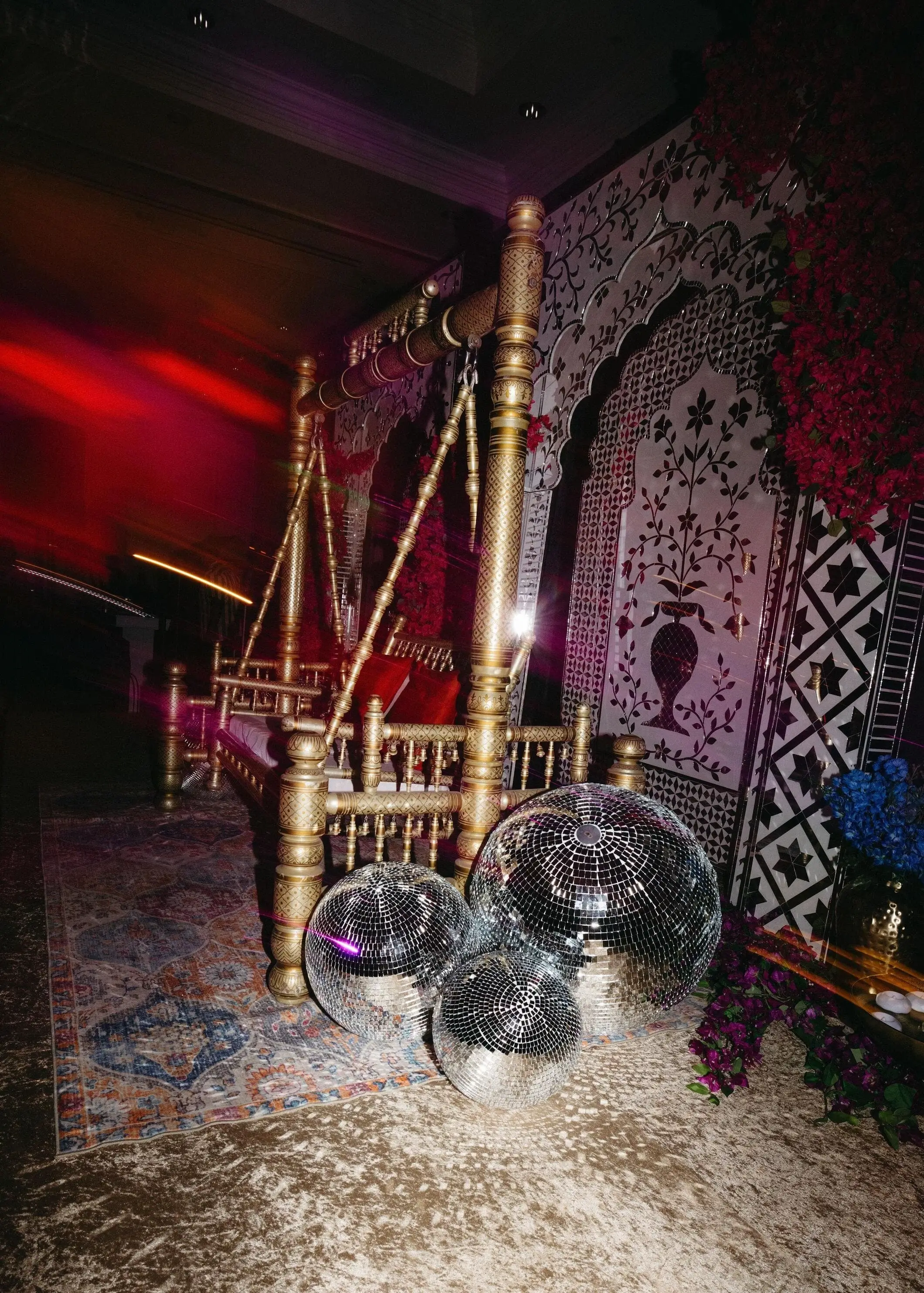 Welcome lounge with curated florals and brass