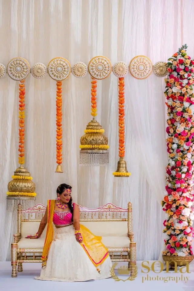 Florals and lighting against a draped backdrop